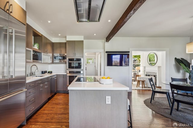 61 Homestead St, San Francisco, CA 94114 - kitchen featuring built in appliances, a sink, light countertops, beamed ceiling, and dark wood-style floors