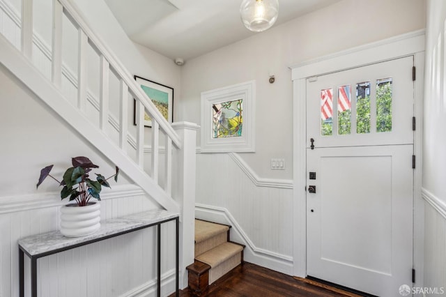 61 Homestead St, San Francisco, CA 94114 - entryway featuring stairway, a wainscoted wall, a decorative wall, and dark wood-type flooring