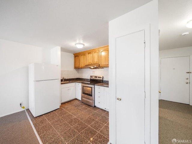 1220 La Playa St Unit 105, San Francisco, CA 94122 - kitchen featuring freestanding refrigerator, electric range, under cabinet range hood, and dark countertops
