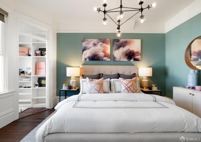 bedroom featuring wood finished floors