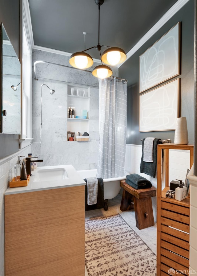 bathroom featuring shower / tub combo with curtain, tile walls, and vanity