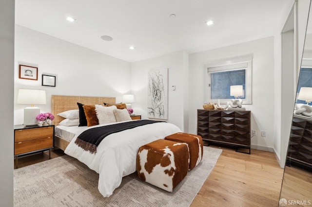 bedroom featuring light wood-type flooring