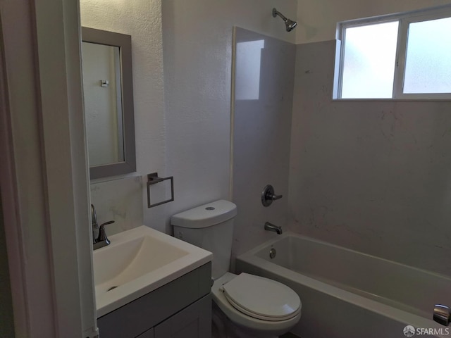 full bath with vanity, toilet, and shower / tub combination