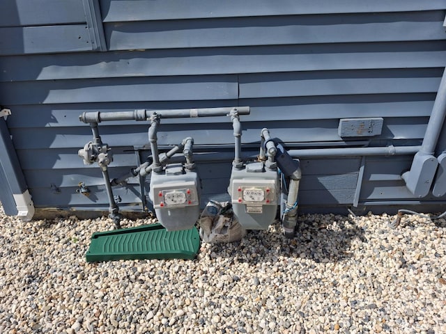 exterior details featuring gas meter