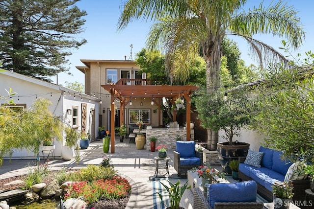 exterior space with a pergola and an outdoor living space