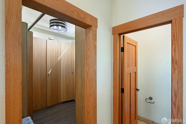 hall with dark wood finished floors