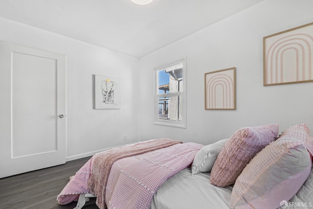 bedroom featuring dark hardwood / wood-style floors