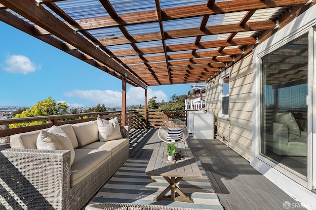 deck with an outdoor living space and a pergola