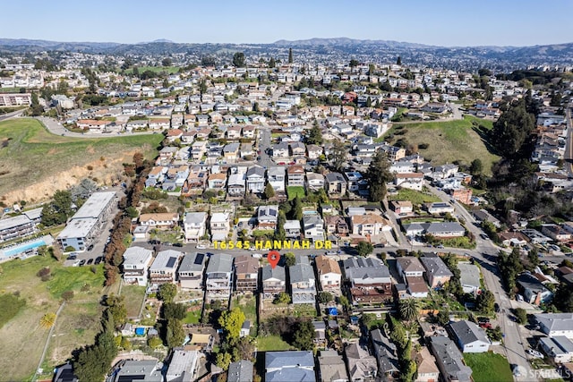 drone / aerial view featuring a mountain view