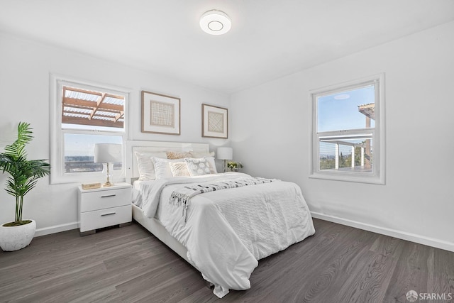 bedroom featuring dark hardwood / wood-style flooring