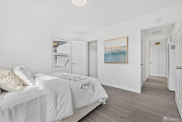 bedroom featuring hardwood / wood-style floors