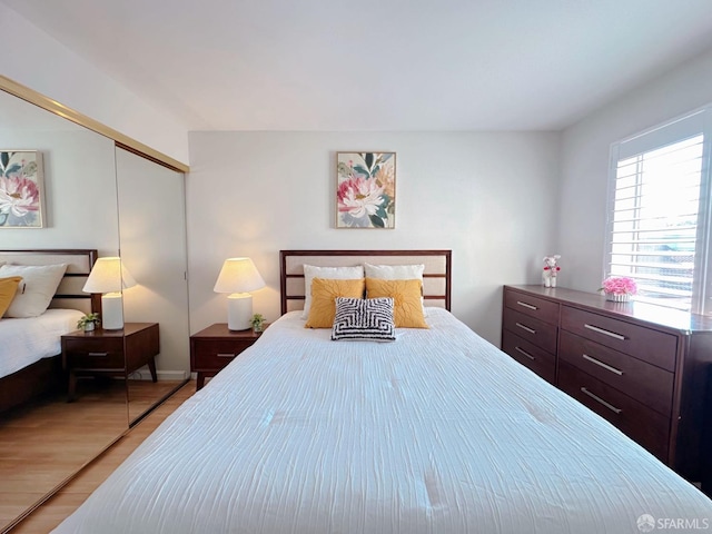 1951 Ofarrell St Unit 420, San Mateo, CA 94403 - bedroom featuring a closet and light wood-style flooring