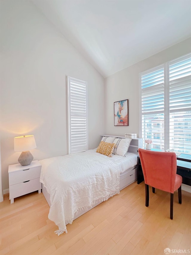 1951 Ofarrell St Unit 420, San Mateo, CA 94403 - bedroom with light wood-style floors and lofted ceiling