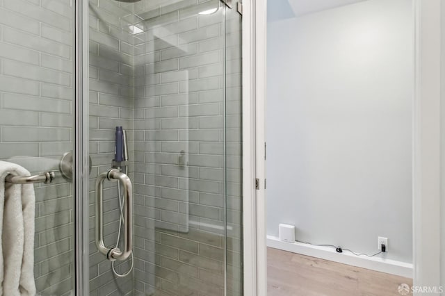 3011 Van Ness Ave, San Francisco, CA 94109 - bathroom with a stall shower and wood finished floors
