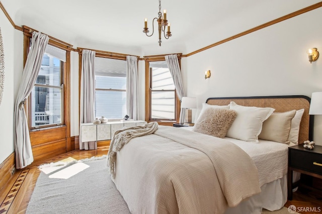 3011 Van Ness Ave, San Francisco, CA 94109 - bedroom featuring a chandelier and light wood finished floors