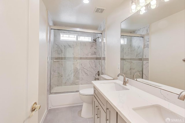 95 Olmsted Ct, Pittsburg, CA 94565 - full bath with bath / shower combo with glass door, double vanity, and tile patterned flooring