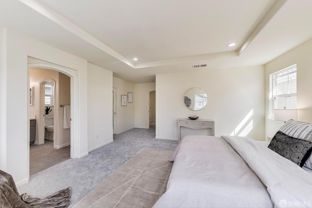 95 Olmsted Ct, Pittsburg, CA 94565 - bedroom with light carpet, arched walkways, a raised ceiling, and recessed lighting