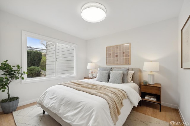 bedroom featuring light wood-type flooring