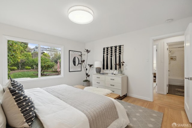 bedroom featuring light hardwood / wood-style floors