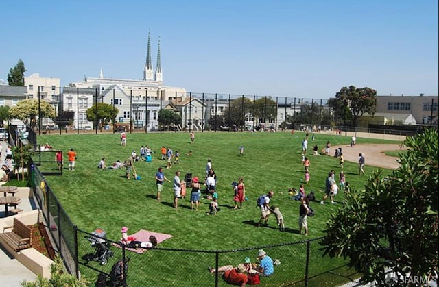 view of home's community featuring a yard