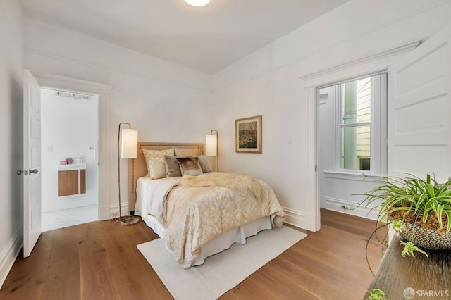291 Church St, San Francisco, CA 94114 - bedroom with wood finished floors and baseboards