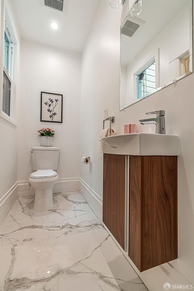 291 Church St, San Francisco, CA 94114 - half bath featuring vanity, recessed lighting, and marble finish floors