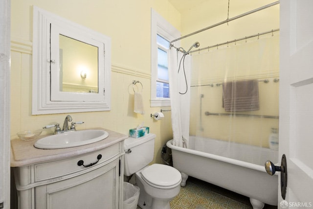 full bathroom featuring vanity, toilet, and shower / bath combo