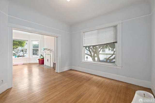 unfurnished room featuring light hardwood / wood-style flooring