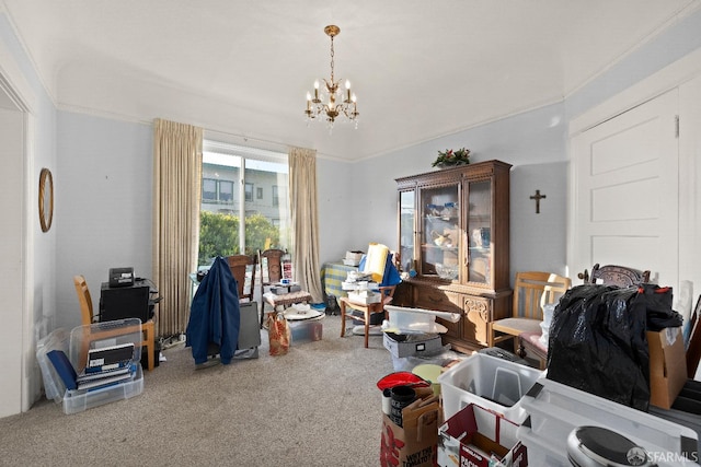 miscellaneous room with a notable chandelier and carpet