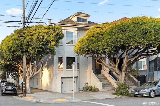 view of front of property featuring a garage