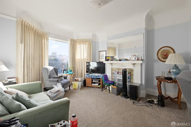 living room with carpet and a fireplace