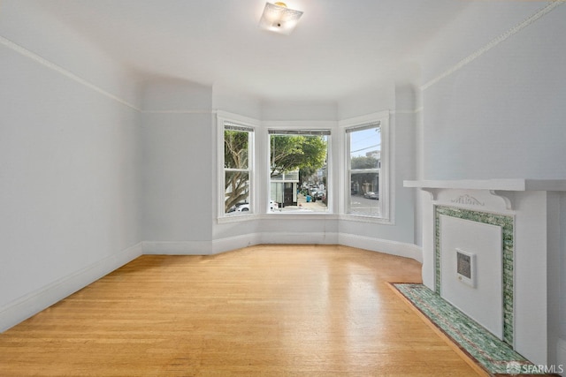 unfurnished living room with light wood-type flooring