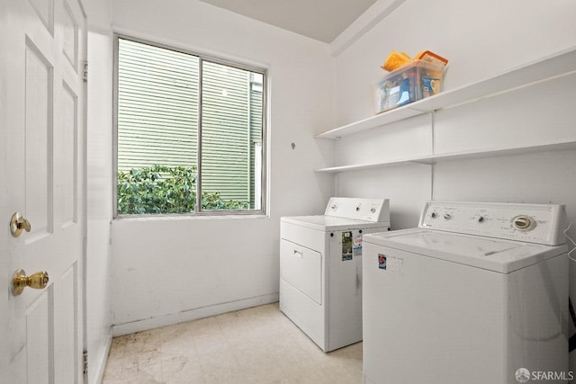 laundry room featuring separate washer and dryer