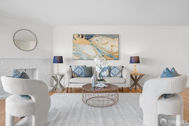 living room featuring a fireplace and wood finished floors