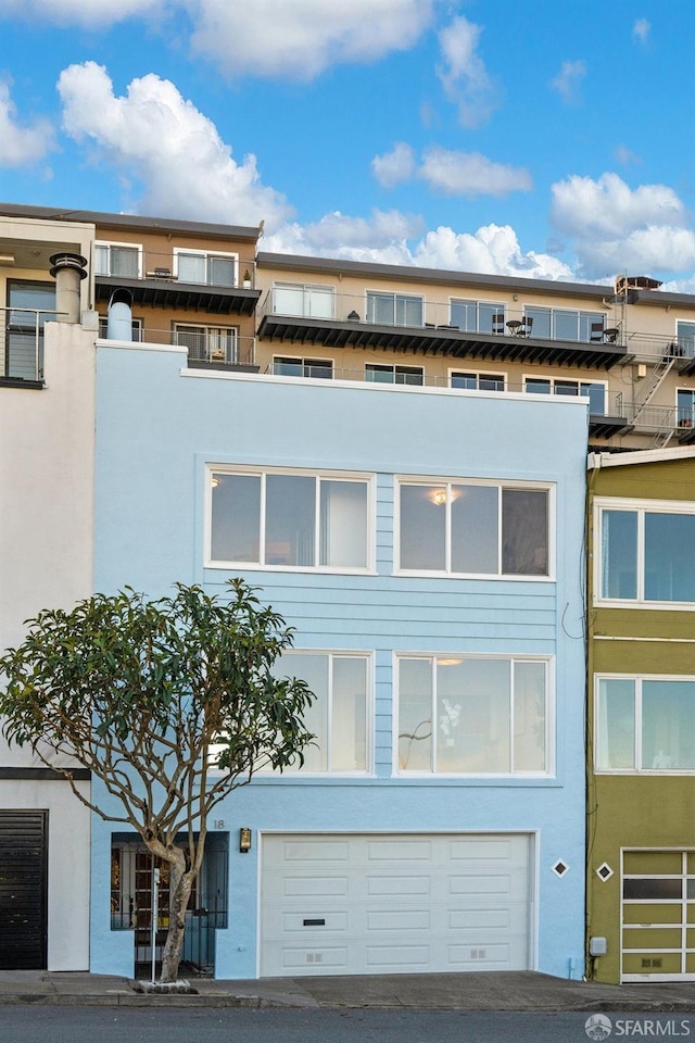 view of building exterior with a garage