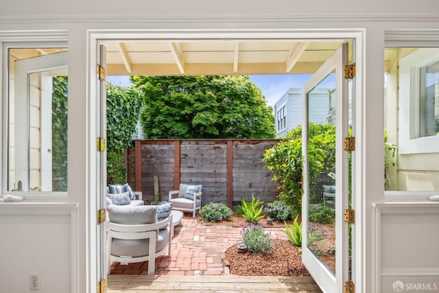 doorway featuring brick floor