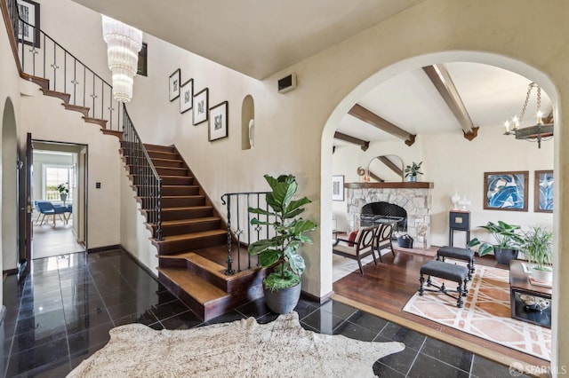 1475 Monterey Blvd, San Francisco, CA 94127 - stairs with granite floors, a chandelier, beam ceiling, and baseboards