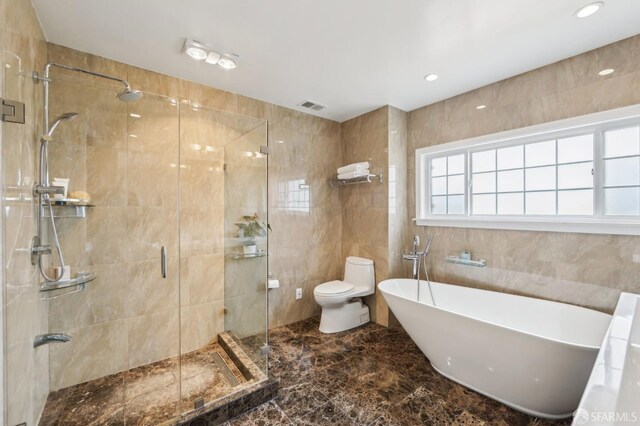 1475 Monterey Blvd, San Francisco, CA 94127 - full bath with a freestanding bath, tile walls, toilet, a shower stall, and marble tiled floors
