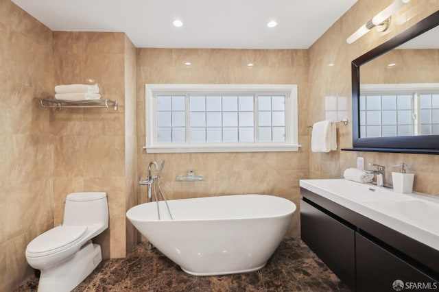 1475 Monterey Blvd, San Francisco, CA 94127 - bathroom with tile walls, a freestanding tub, vanity, marble tiled flooring, and toilet
