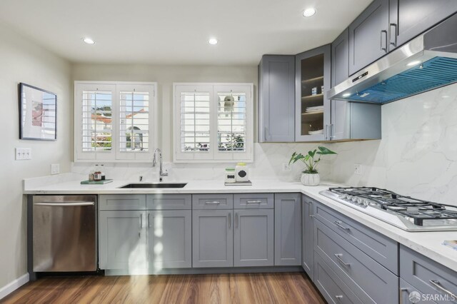 1475 Monterey Blvd, San Francisco, CA 94127 - kitchen with a sink, under cabinet range hood, gray cabinets, stainless steel dishwasher, and recessed lighting