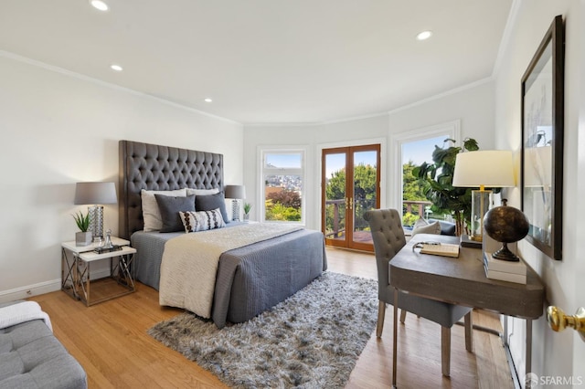 bedroom featuring access to outside, recessed lighting, ornamental molding, and wood finished floors