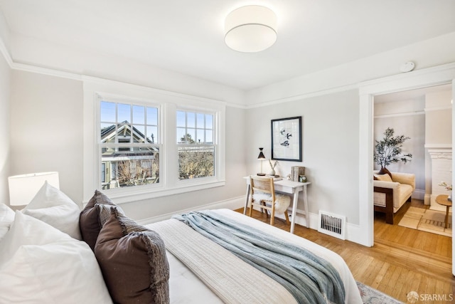 bedroom with wood-type flooring