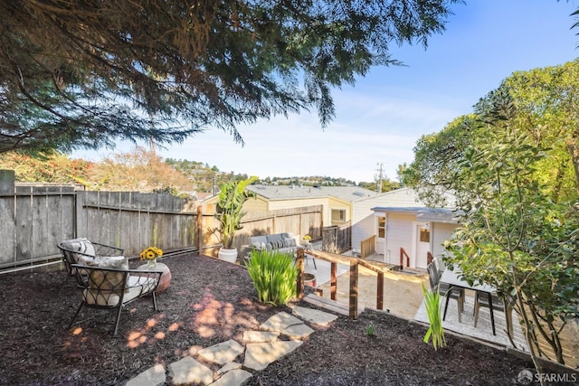 view of yard featuring an outdoor living space and a patio