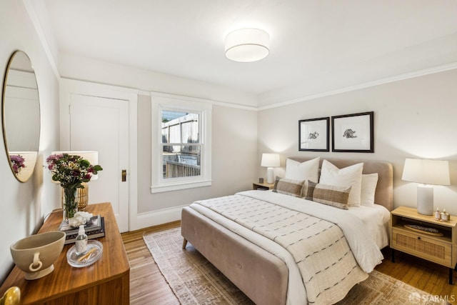 bedroom featuring hardwood / wood-style flooring