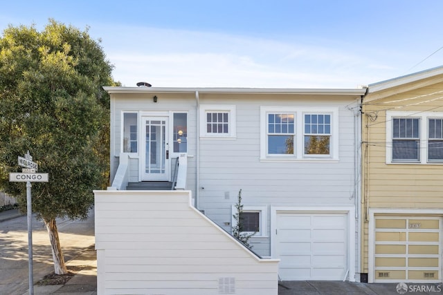 view of front of home with a garage