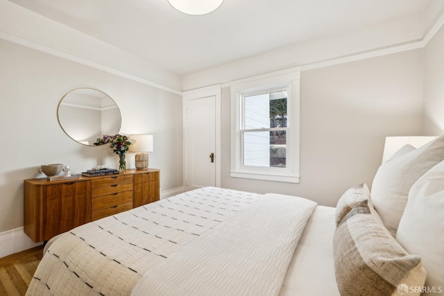 bedroom with wood-type flooring