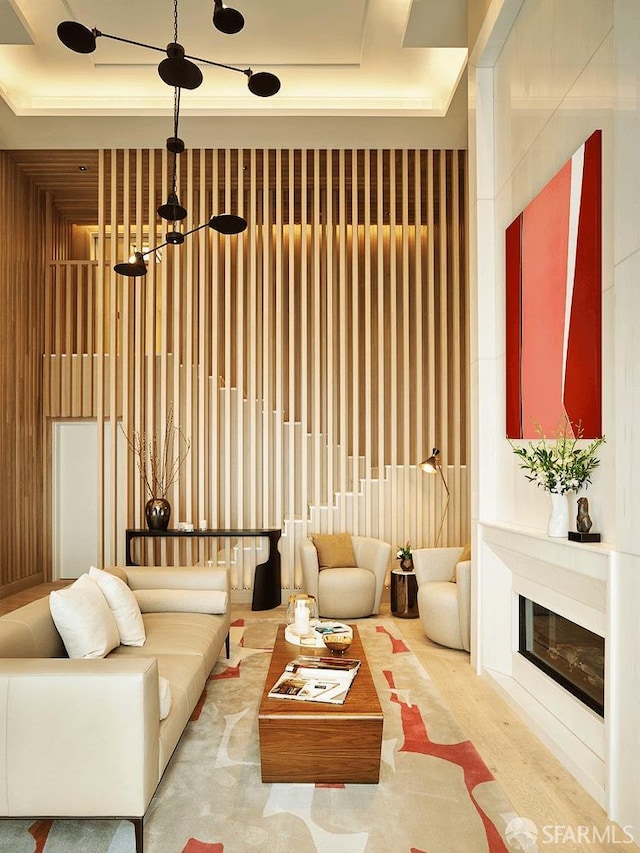 living room featuring a raised ceiling