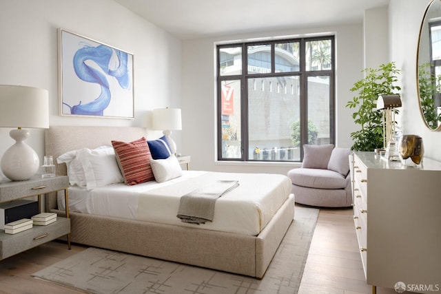 bedroom featuring light wood-type flooring