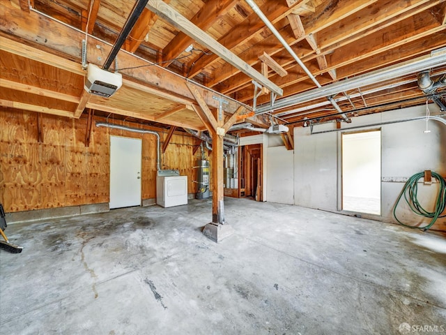 173 Warren Dr, San Francisco, CA 94131 - garage featuring washer / clothes dryer, a garage door opener, and secured water heater