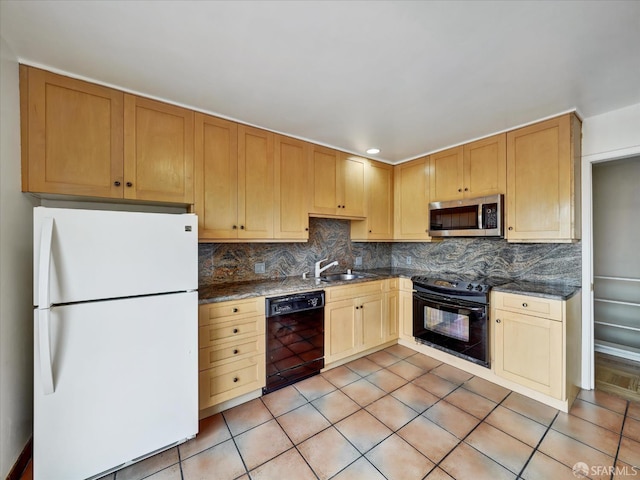 173 Warren Dr, San Francisco, CA 94131 - kitchen featuring black appliances, decorative backsplash, and light tile patterned floors